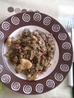Una foto de Arroz negro con chipirones
