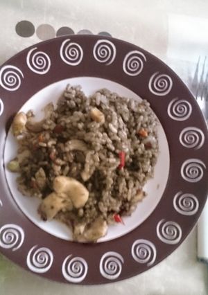 Una foto de Arroz negro con chipirones