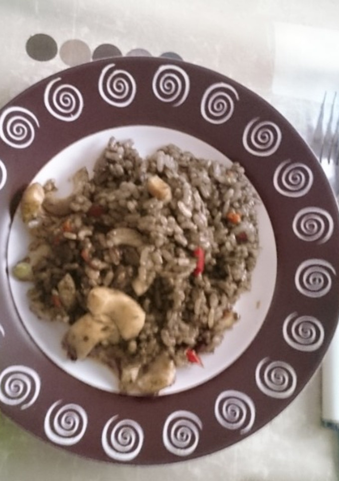 Una foto de Arroz negro con chipirones