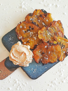 Una foto de Patacones o Tostones