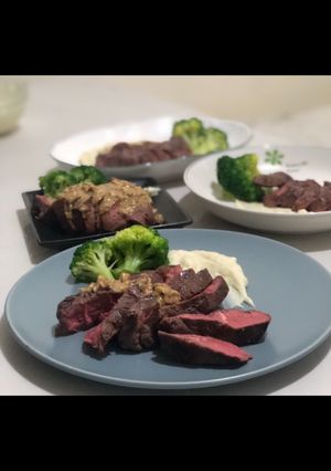 A picture of Pan-Seared Steak with Mashed Potatoes.