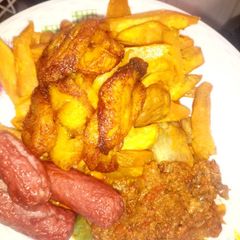 Dankali plantain with sausage & souce A picture of Dankali plantain with sausage & souce.