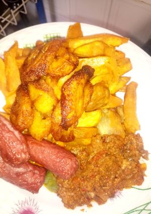A picture of Dankali plantain with sausage & souce.
