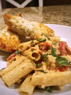 A picture of Baked feta and tomato pasta.