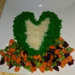 Green and white rice with vegetable sauce A picture of Green and white rice with vegetable sauce.