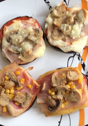 Una foto de Mini pizzas con berenjena