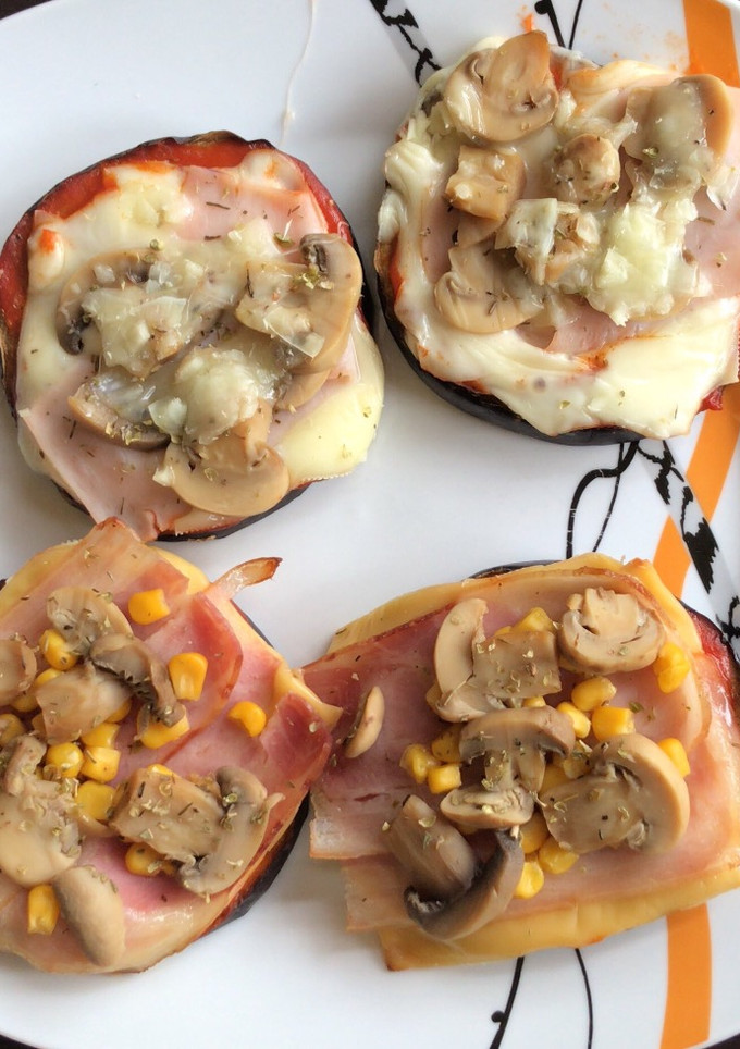 Una foto de Mini pizzas con berenjena