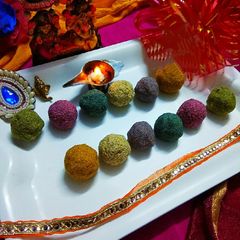 A picture of Colourful Rava Ladoos.