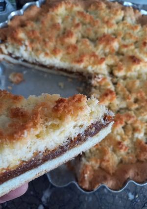 Una foto de Tarta de coco (masa sucre)