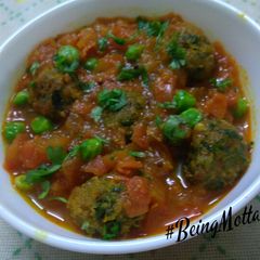 A picture of Muthiya-Tomato-Peas Subzi.