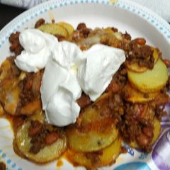 A picture of Loaded Potato Nachos.