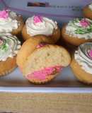 Vanilla cupcakes with cream frosting