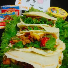 A picture of Chiken_cheese_fajita#In_Pitta_pocket.