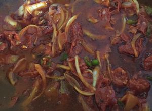 Una foto de Zaragozas (frijoles) con chorizo español, carne y chistorra