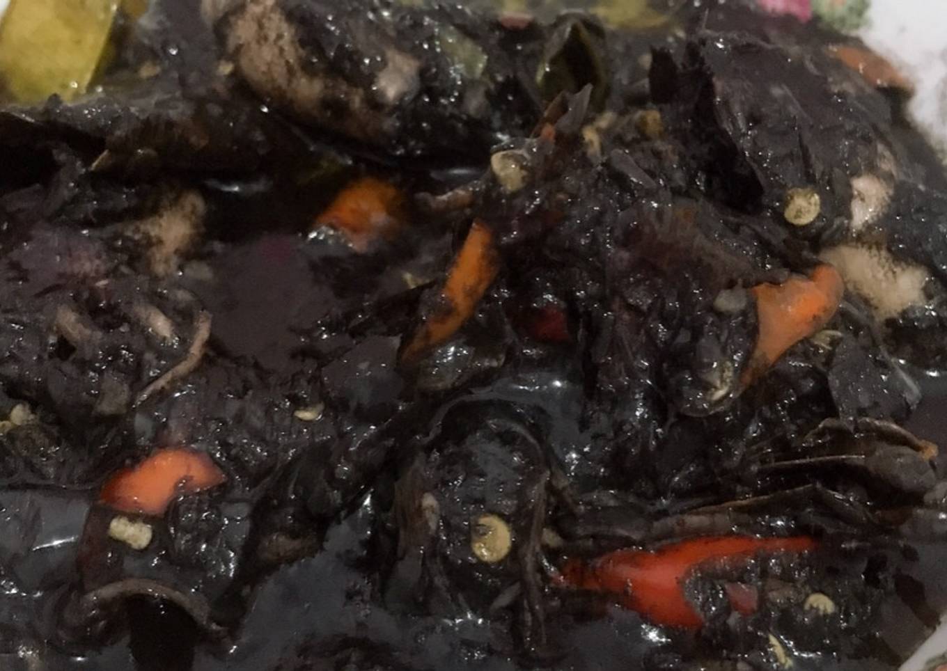 Sotong dengan jus hitam