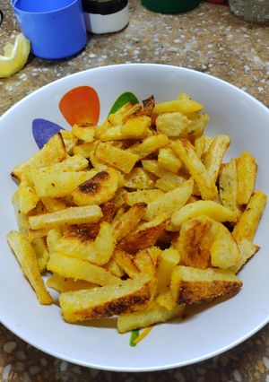 Una foto de Papas con polenta