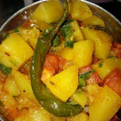 Pressure Cooker Aloo Sabzi A picture of Pressure Cooker Aloo Sabzi .