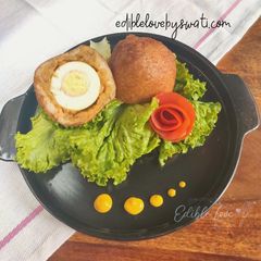 A picture of Boiled Egg bread roll or Potato scotch eggs.