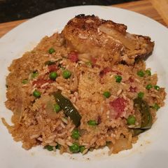A picture of Arroz Con Pollo - Rice w/ Chicken.