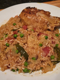 A picture of Arroz Con Pollo - Rice w/ Chicken.