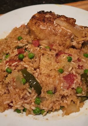 A picture of Arroz Con Pollo - Rice w/ Chicken.