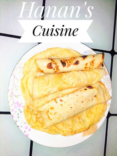 A picture of Crepes with Cabbage Sauce.
