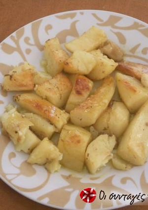 A picture of Different potatoes in the oven.