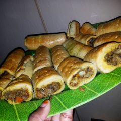 A picture of Baked fish rolls.