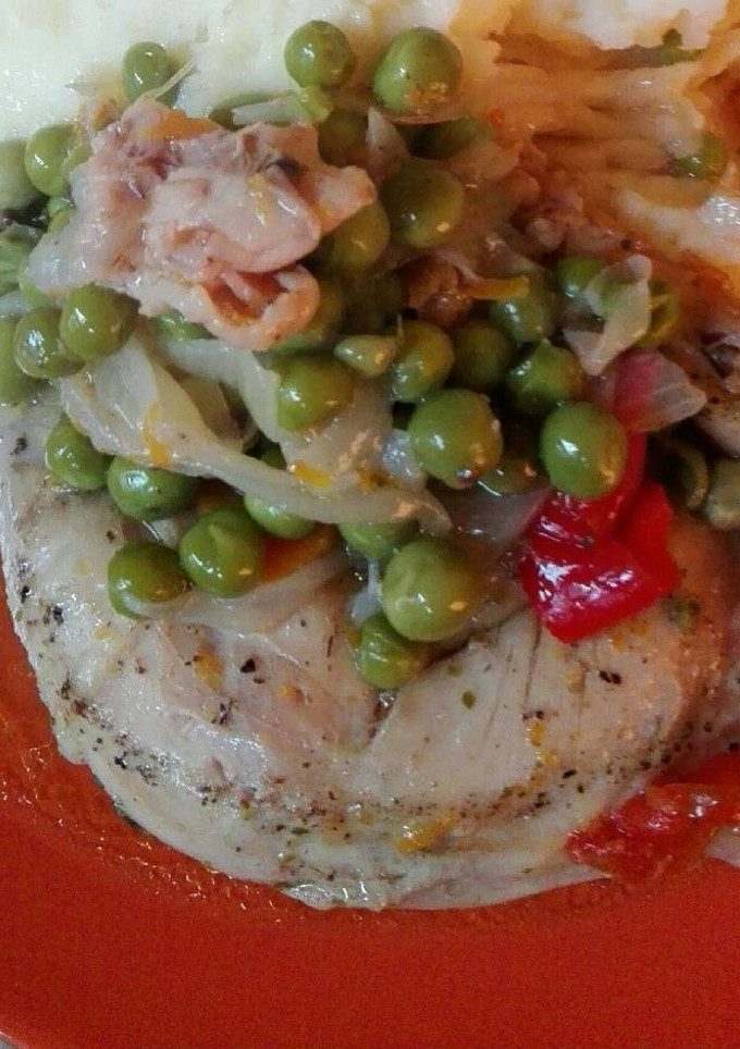 Una foto de Pollo arverjado