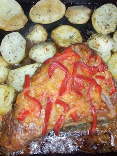 Una foto de Colita de cuadril al horno con papas