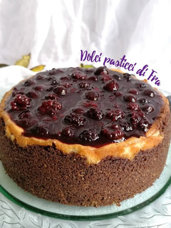 Foto di Cheesecake al cacao, more e mirtilli
