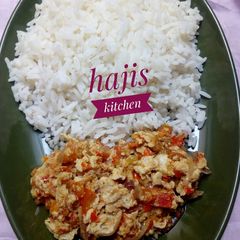 A picture of Rice and egg sauce.