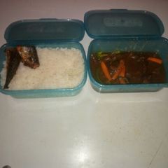 A picture of White rice with fish sauce.