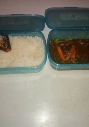A picture of White rice with fish sauce.