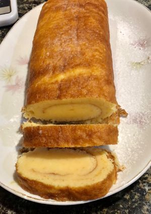 Una foto de Pionono relleno Curd Orange