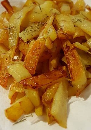 Una foto de Papas fritas al horno con romero y jengibre