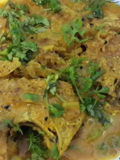 A picture of Shorshe Pomfret (Pomfret in mustard paste).