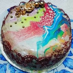 A picture of Rainbow Mirror Glazed Mousse Cake.