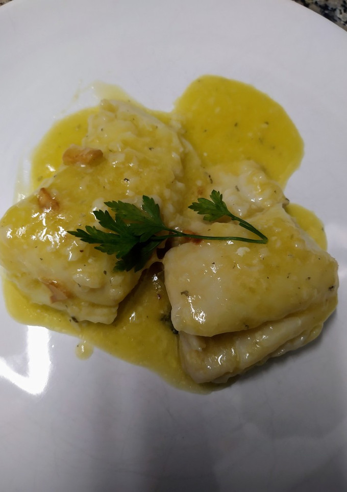 Una foto de Bacalao al pil pil