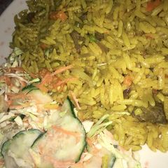 Fried rice and coleslaw A picture of Fried rice and coleslaw.