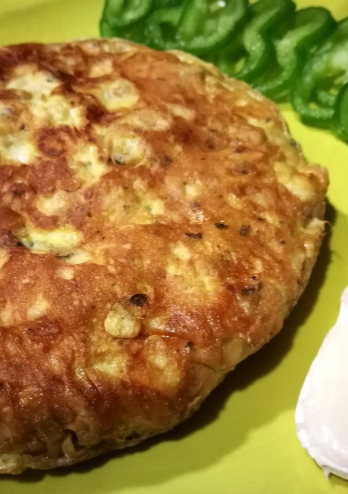 Una foto de Tortilla con dos quesos y garbanzos