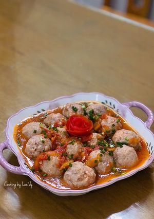 Hình của món Thịt băm bọc trứng sốt cà chua.