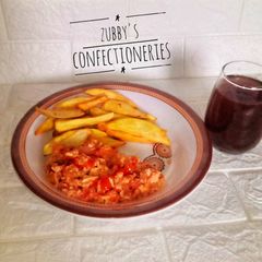 A picture of Fried potatoes with egg sauce (sweet potatoes).
