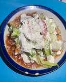 Flautas en salsa de chipotle