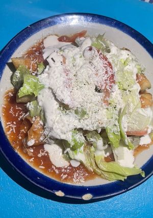 A picture of Flautas in Chipotle Sauce.