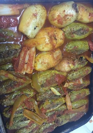 صورة لوصفة صنيه كوسا باللحمه وصوص بندوره