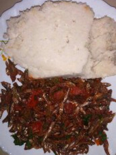A picture of Fried Omena and Ugali.