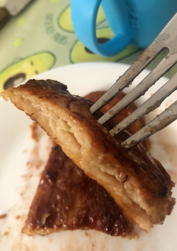Una foto de Torrijas de chocolate y naranja, con panecillos de leche