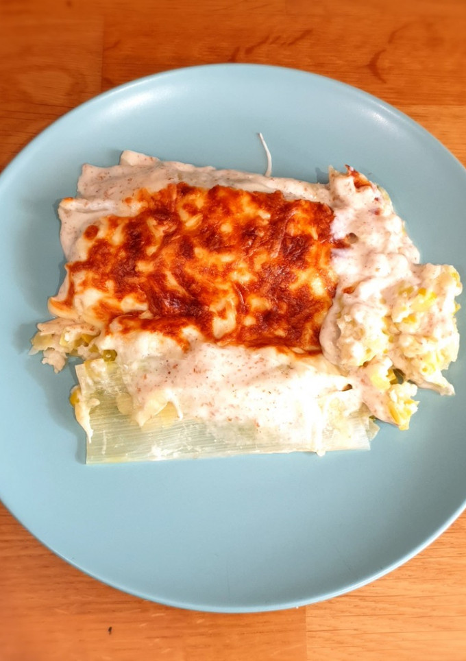 Una foto de Canelones de puerro con gambas y merluza