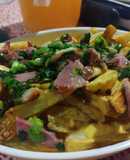 Papas con Cheddar, Panceta y cebollita de Verdeo